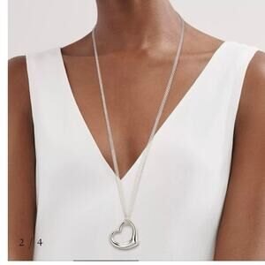 Tiffany and co Elsa peretti open heart pendant on long chain necklace